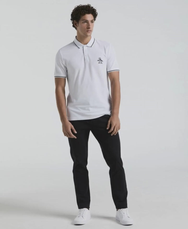 Video of a man wearing the Original Penguin Mega Pete Pique Polo in the color Bright White